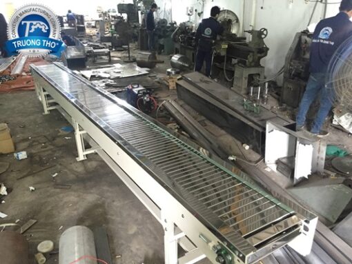 băng tải xích tấm inox